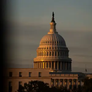 Democrats Denounce Shutdown Vote, and Trump Issues Flurry of Pardons