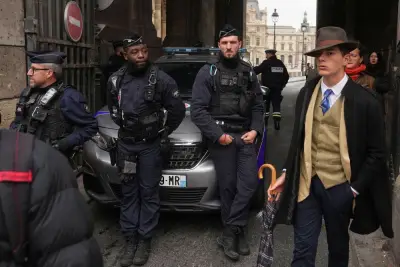 ‘Fedora man’ in Louvre heist photos is a very stylish 15-year-old