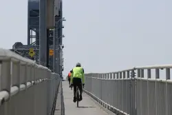 Bicyclists keep getting hurt riding into mystery string on Marine Parkway Bridge