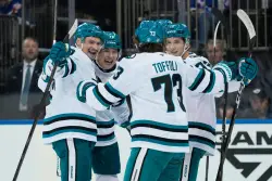 San Jose Sharks earn first win behind Smith’s OT goal, Celebrini’s huge game