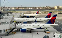 2 Delta planes collide while taxiing at LaGuardia Airport, injuring flight attendant