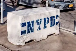 Woman found dead on Lower East Side sidewalk near park, police say